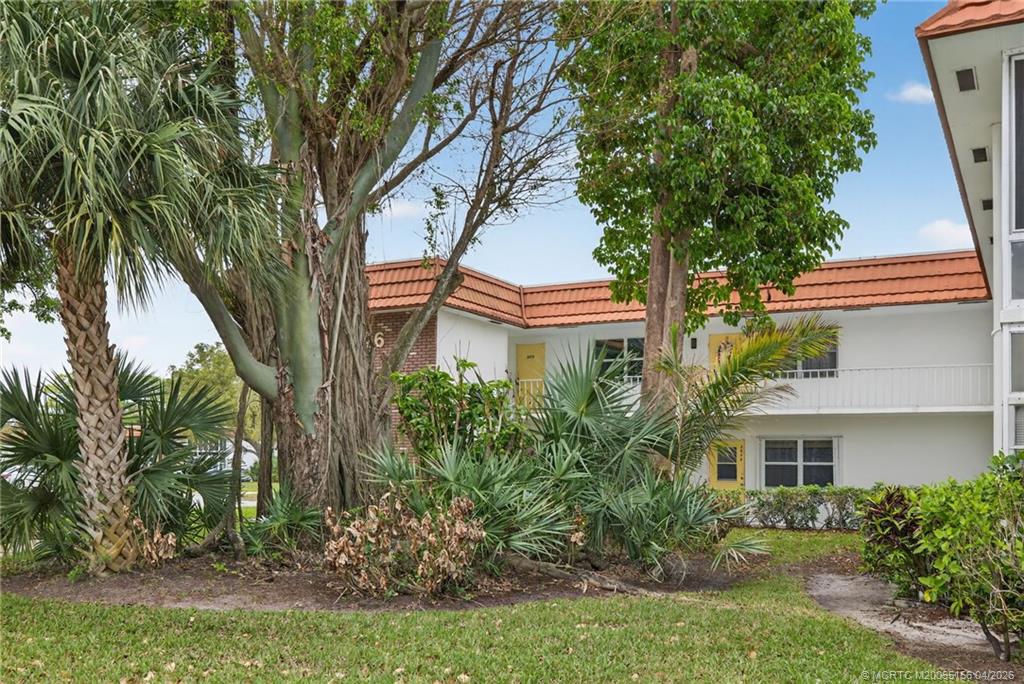 1225 Northwest 21st Street, Unit 2615 Stuart, FL 34994 - Photo 22 of 43 Beautiful mature trees at Building 26,