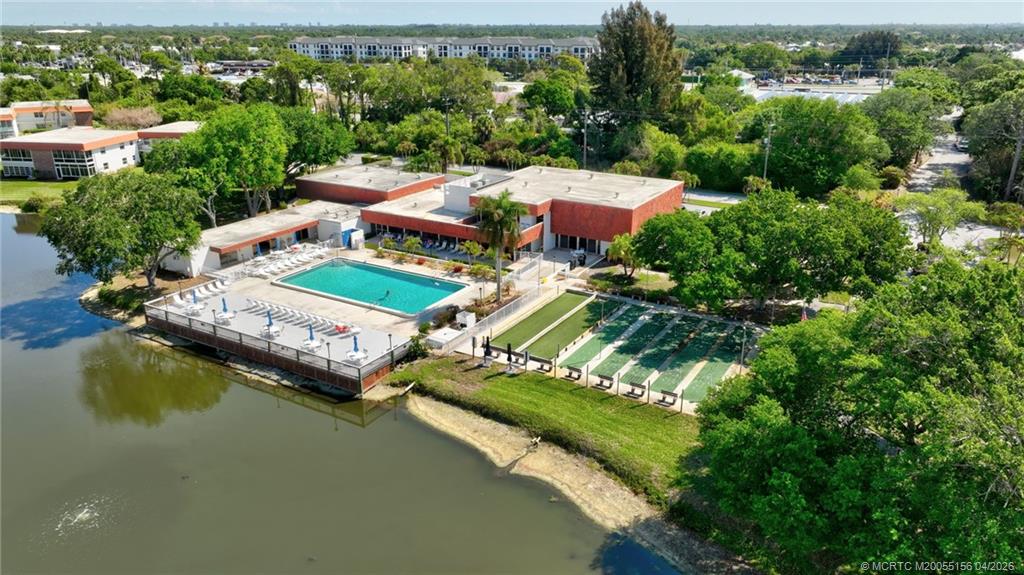 1225 Northwest 21st Street, Unit 2615 Stuart, FL 34994 - Photo 33 of 43 Waterfront pool and clubhouse.