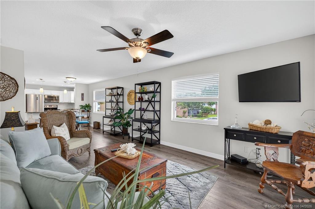 1225 Northwest 21st Street, Unit 2615 Stuart, FL 34994 - Photo 8 of 43 Impact windows, updated lighting, luxury vinyl flooring!