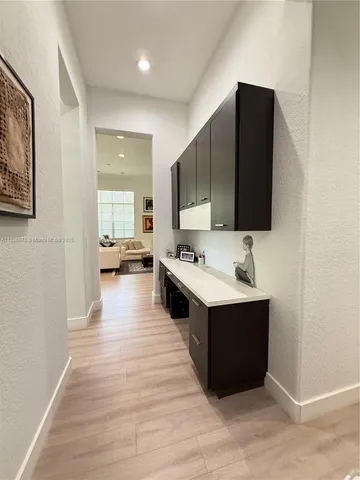 a view of living room with furniture and flat screen tv
