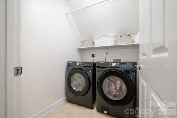 a view of washer and dryer in a utility room