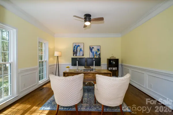 a living room with couches and a coffee table