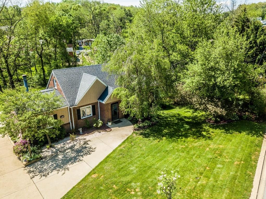 This 3 BR, 2 BA home sits on over .5 acre of land is nestled among mature trees and beautiful landscaping.