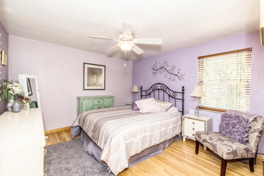 422 Thompsonville Road McMurray, PA 15317 - Photo 12 of 25 First floor master bedroom offers soft palette of color, hardwood floor, closet and one window.