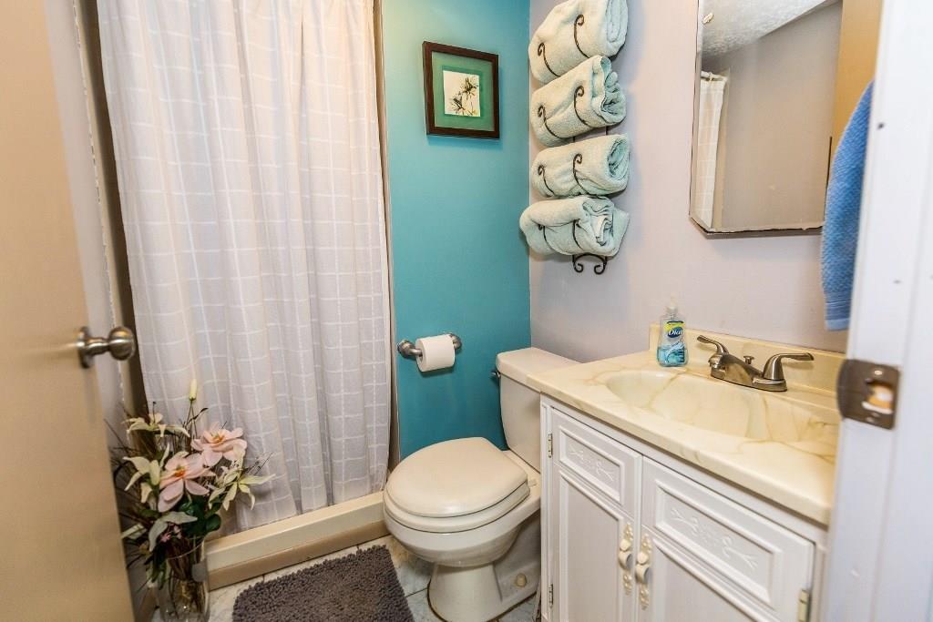 422 Thompsonville Road McMurray, PA 15317 - Photo 17 of 25 Lower level bathroom offers walk-in shower, vanity with solid surface top and toilet.