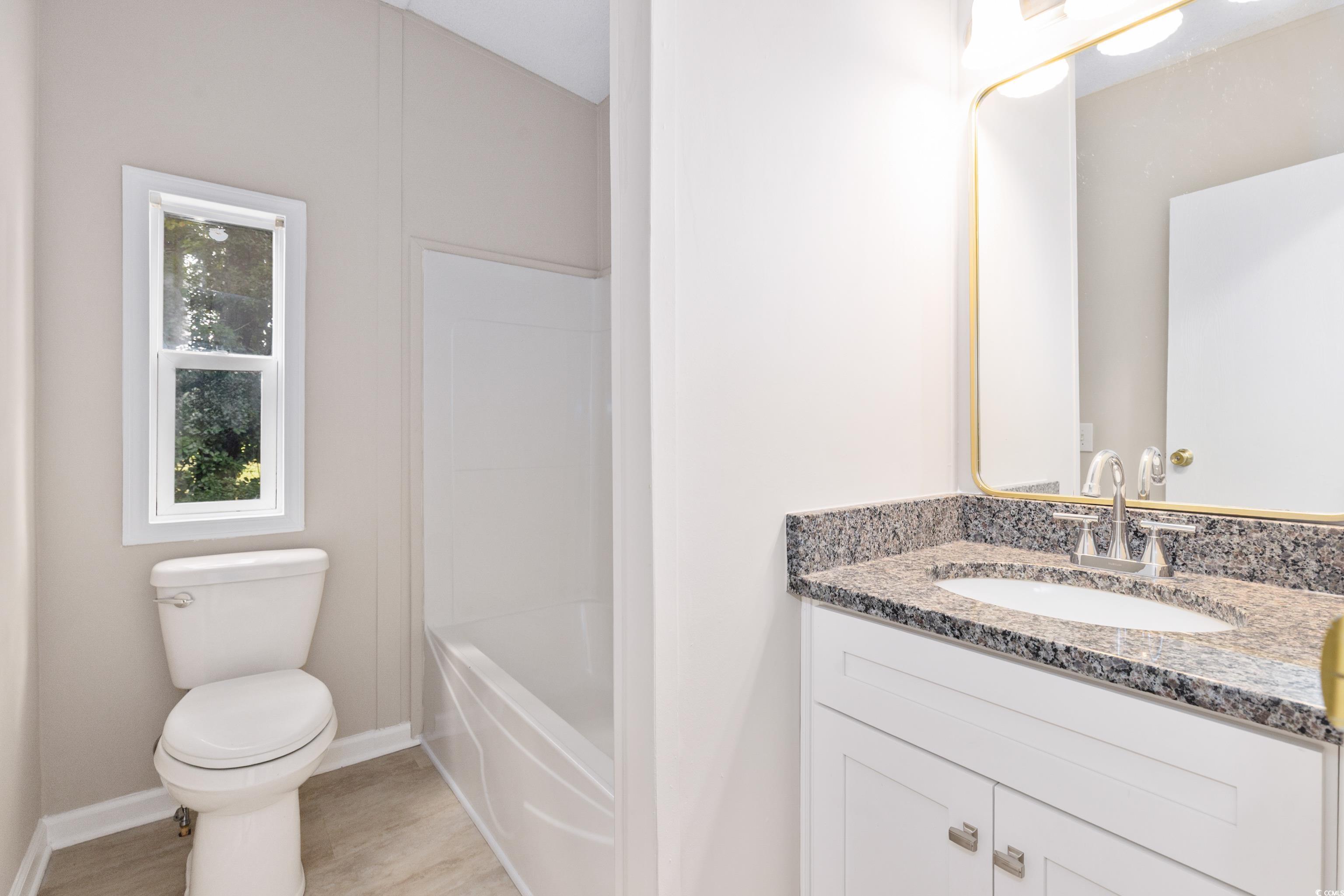 3106 Dog Bluff Road Aynor, SC 29511 - Photo 19 of 27 Full bath with vanity and tub / shower combination