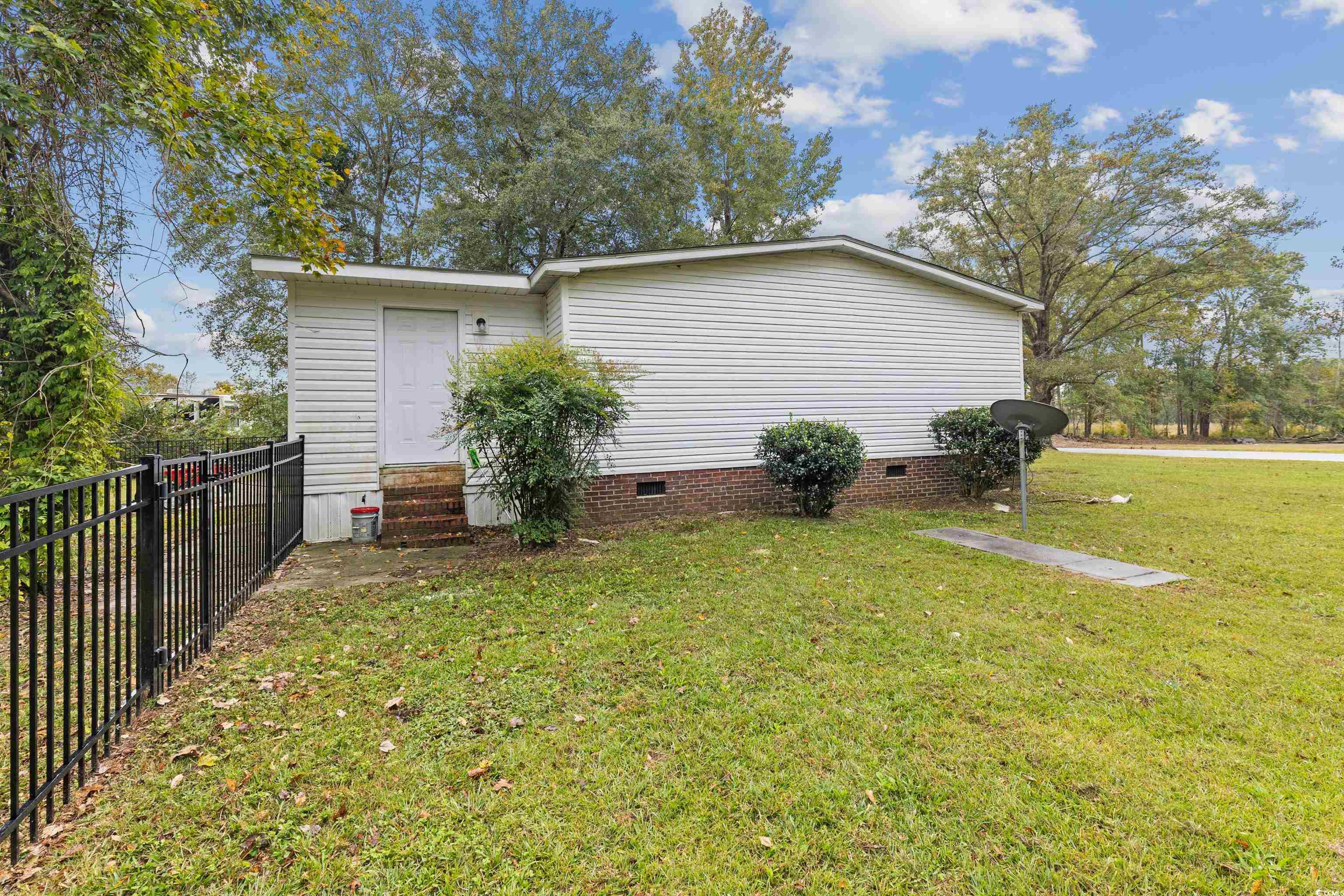 3106 Dog Bluff Road Aynor, SC 29511 - Photo 25 of 27 View of side of property with crawl space and entry steps