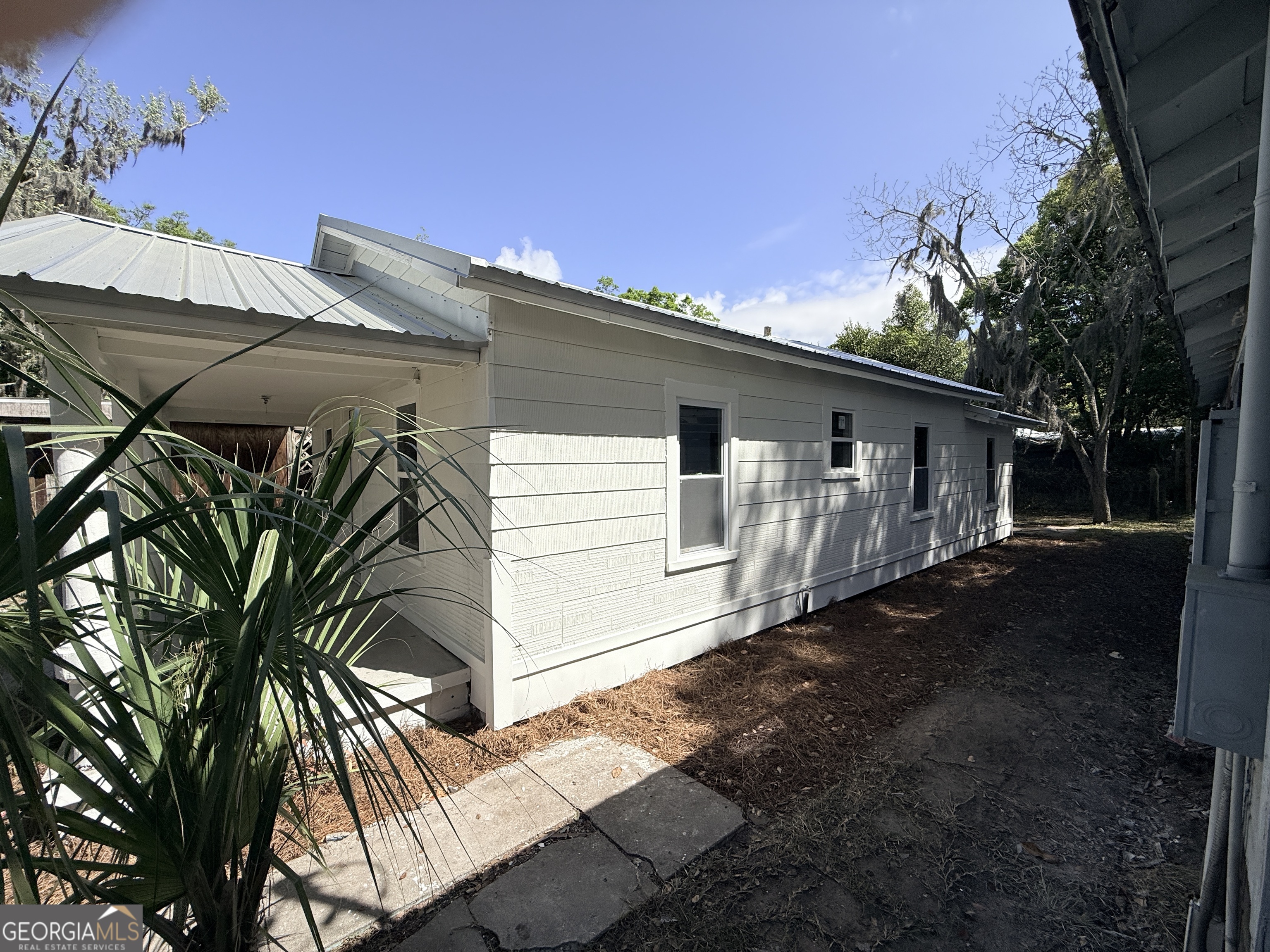 2416 Union Street Brunswick, GA 31520 - Photo 11 of 12 a view of a house with a backyard