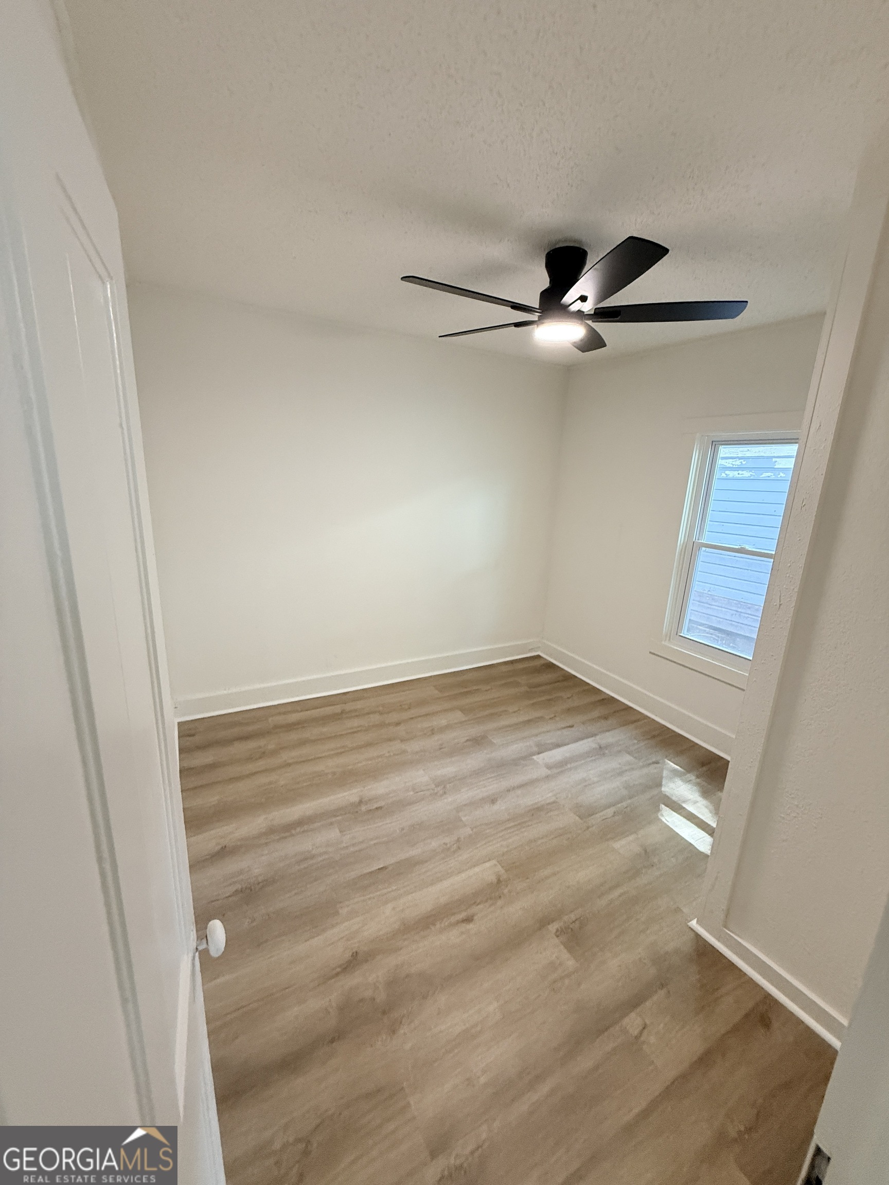 2416 Union Street Brunswick, GA 31520 - Photo 6 of 12 a view of an empty room