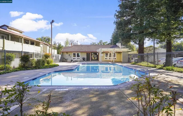a view of a house with swimming pool