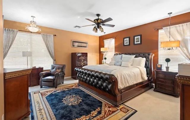 a bed room with a bed and a couch