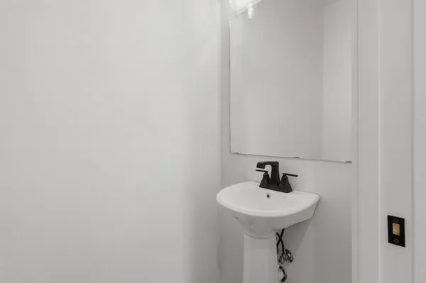 a room that has a bed and a window