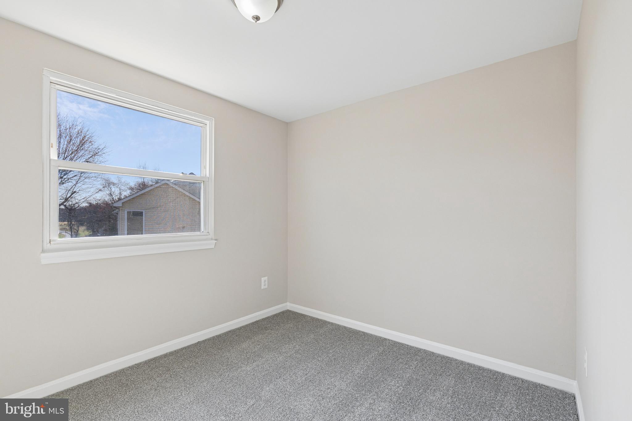 7451 Oakland Mills Road Columbia, MD 21046 - Photo 47 of 83 a view of an empty room with a window