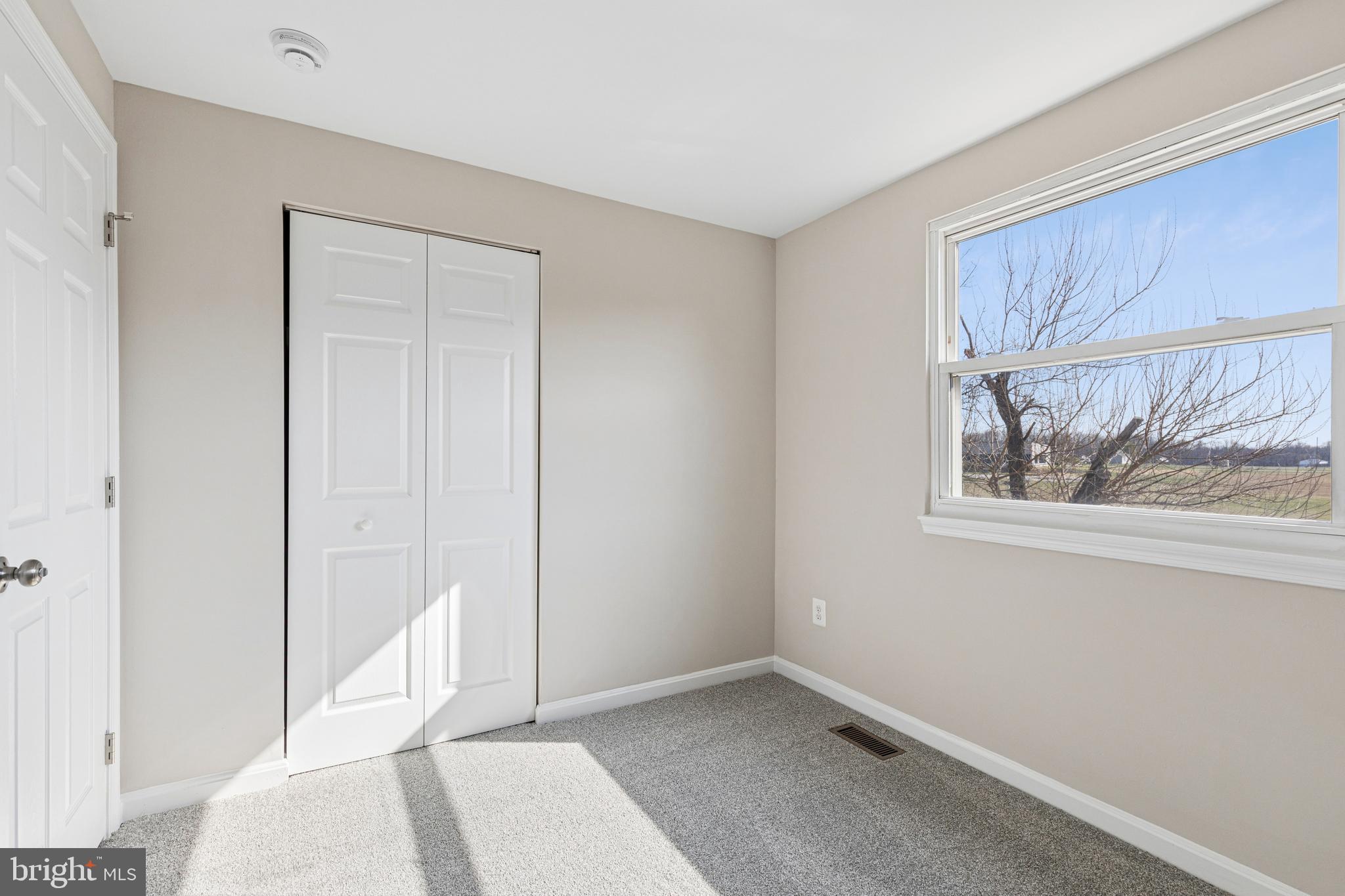 7451 Oakland Mills Road Columbia, MD 21046 - Photo 48 of 83 a view of an empty room with a window