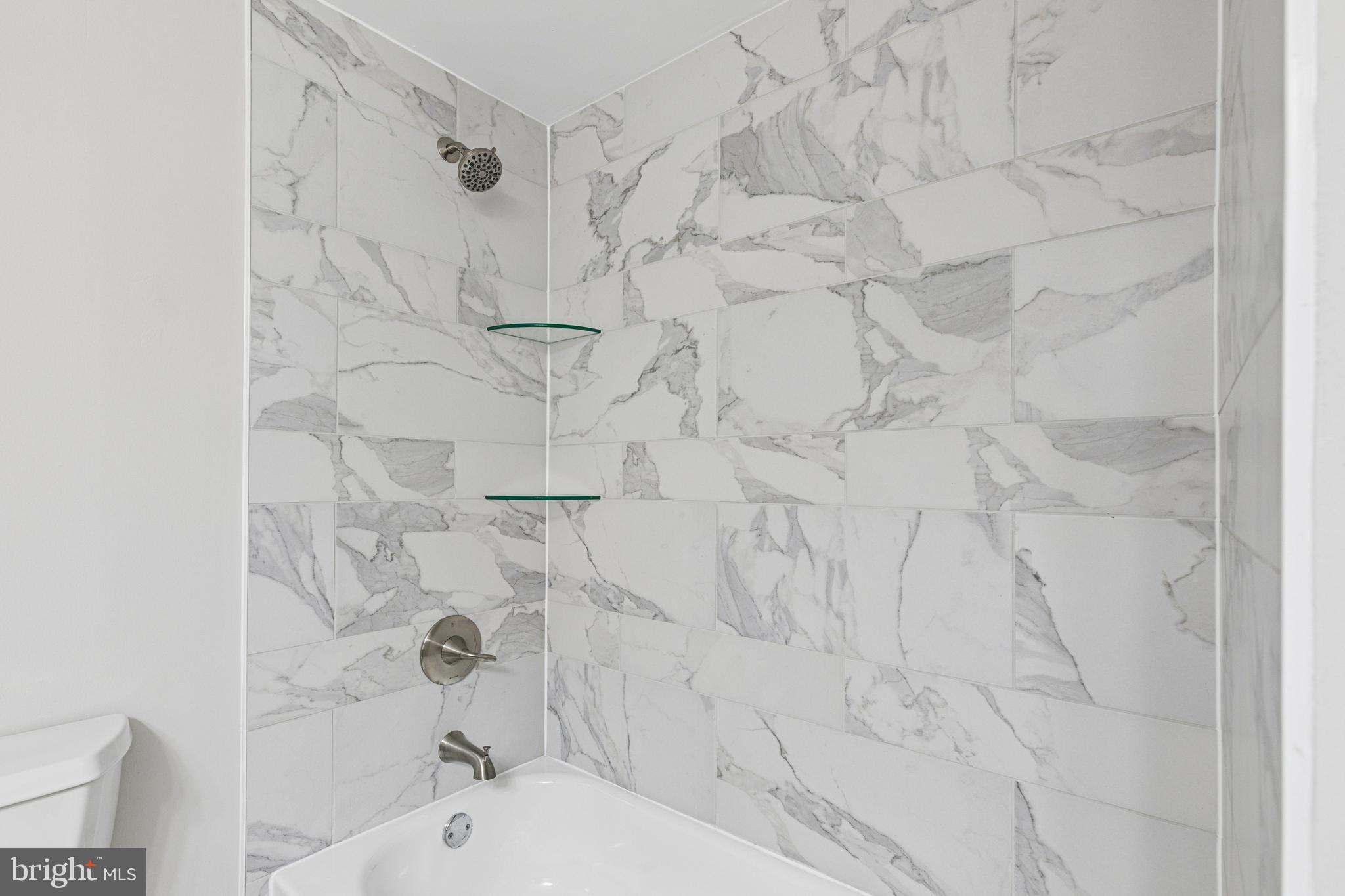 7451 Oakland Mills Road Columbia, MD 21046 - Photo 52 of 83 a bathroom with a shower