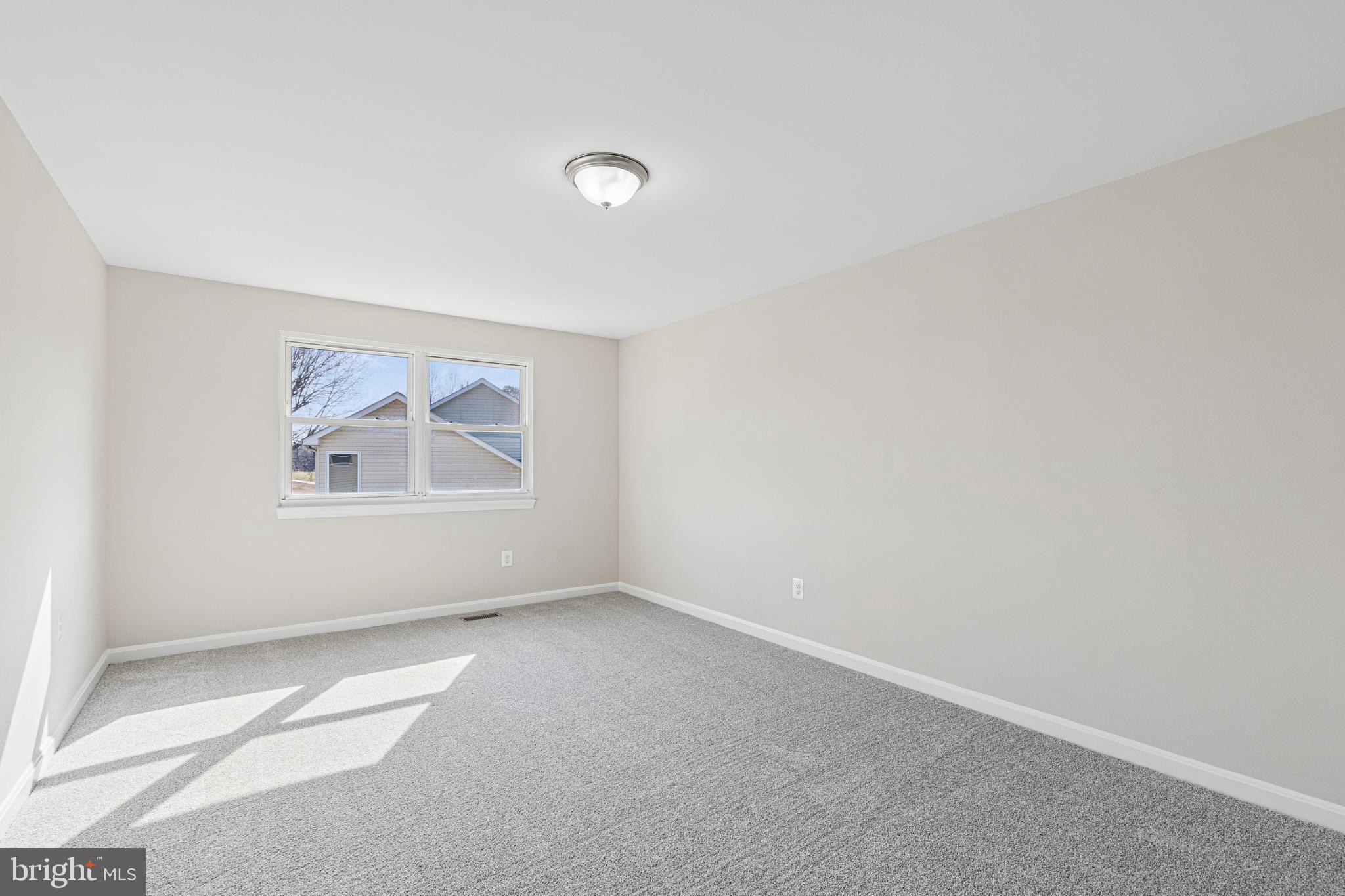 7451 Oakland Mills Road Columbia, MD 21046 - Photo 57 of 83 an empty room with windows