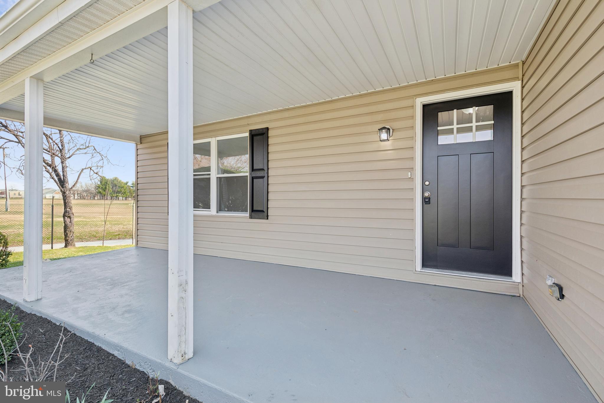 7451 Oakland Mills Road Columbia, MD 21046 - Photo 10 of 83 a view of front door
