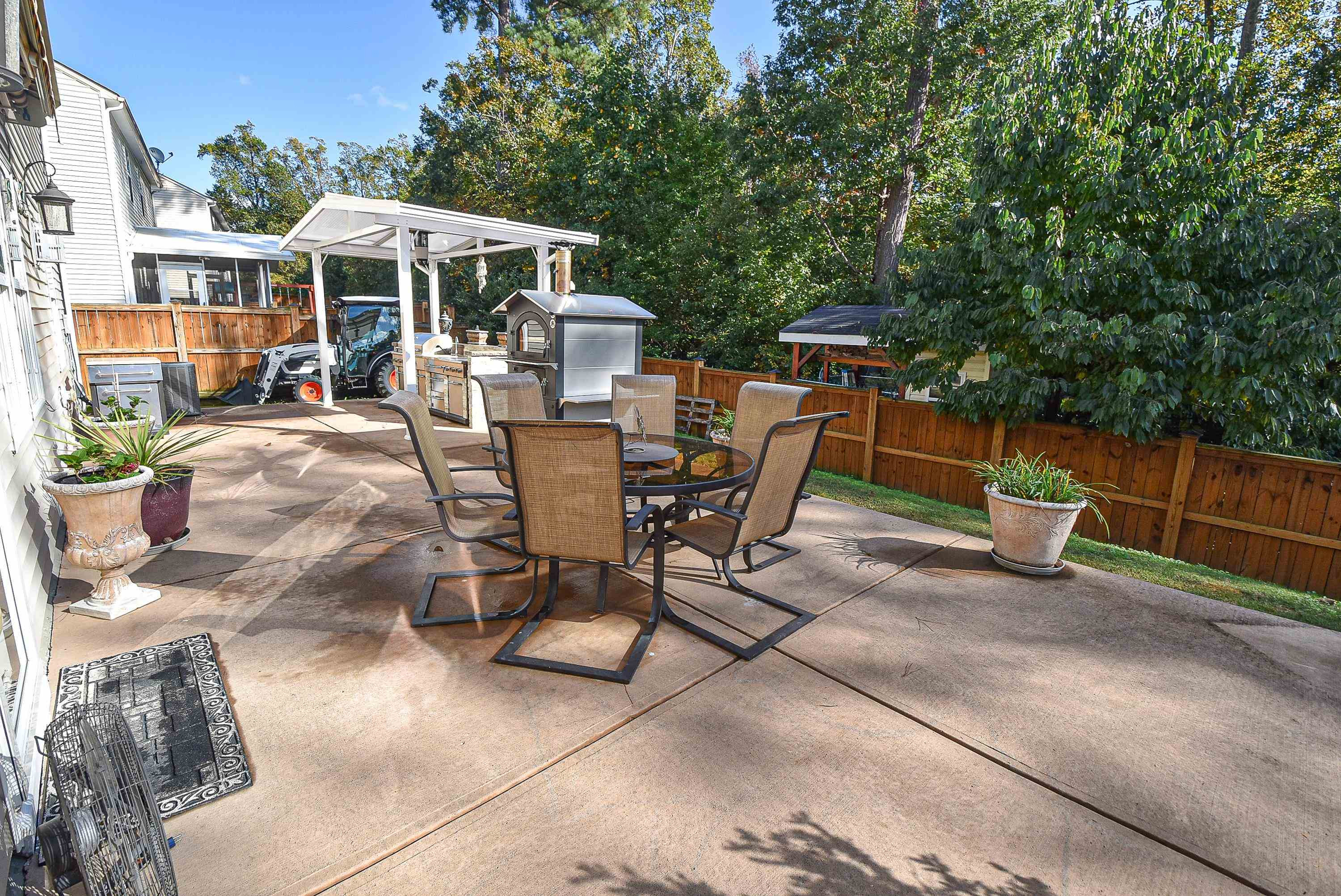 3814 Althorp Drive Raleigh, NC 27616 - Photo 23 of 30 Shows backyard view with awning withdrawn. Backyard view