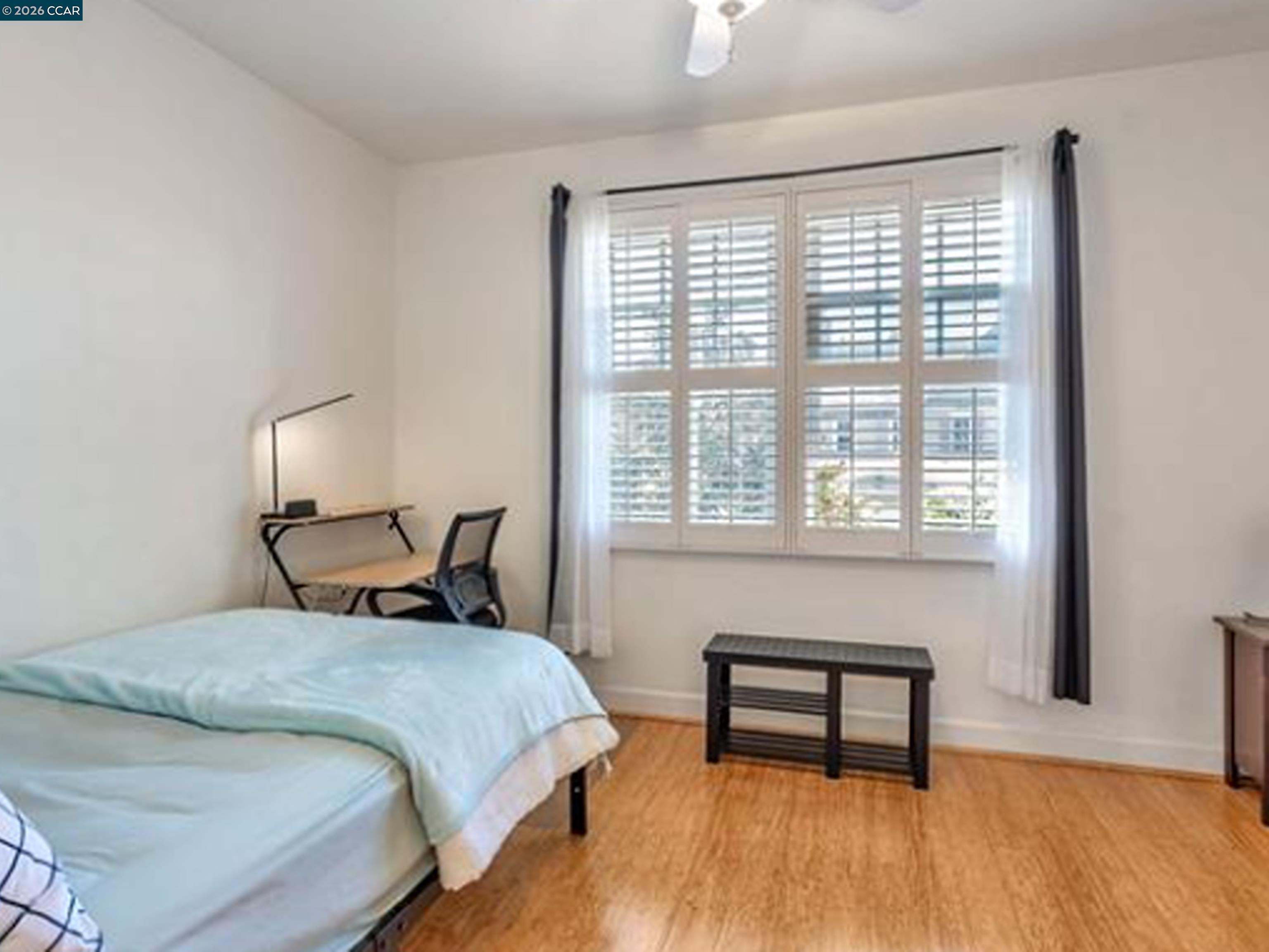 2036 Serra Lane Hercules, CA 94547 - Photo 12 of 50 a bedroom with a bed and a window