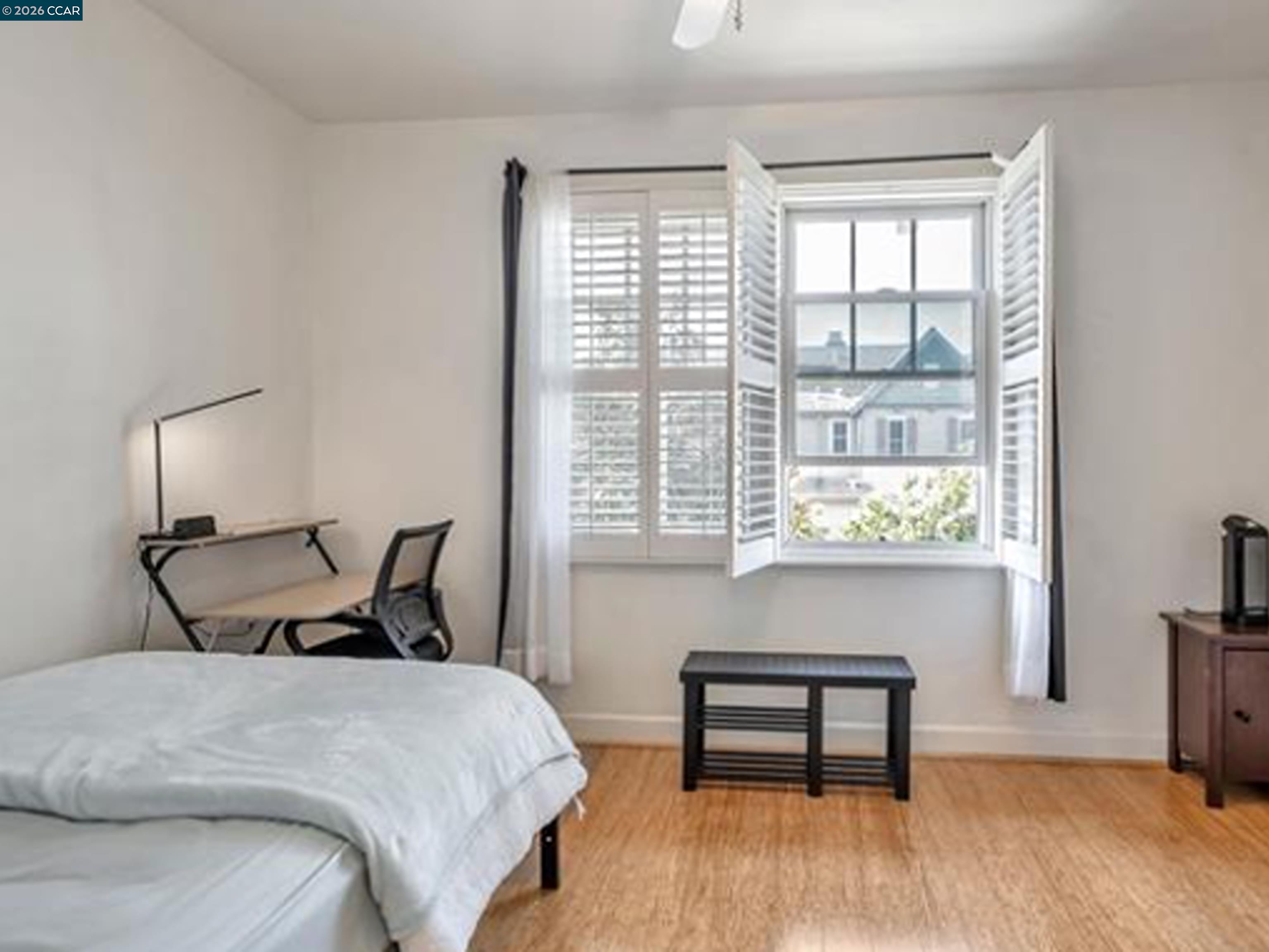 2036 Serra Lane Hercules, CA 94547 - Photo 14 of 50 a bedroom with a bed and a window