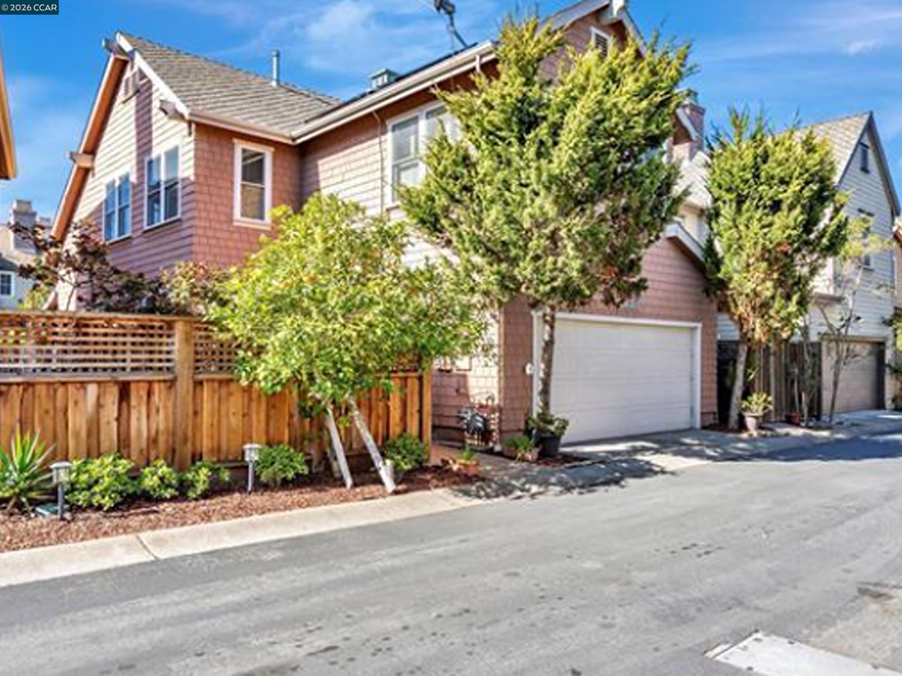 2036 Serra Lane Hercules, CA 94547 - Photo 24 of 50 a front view of a house with a yard