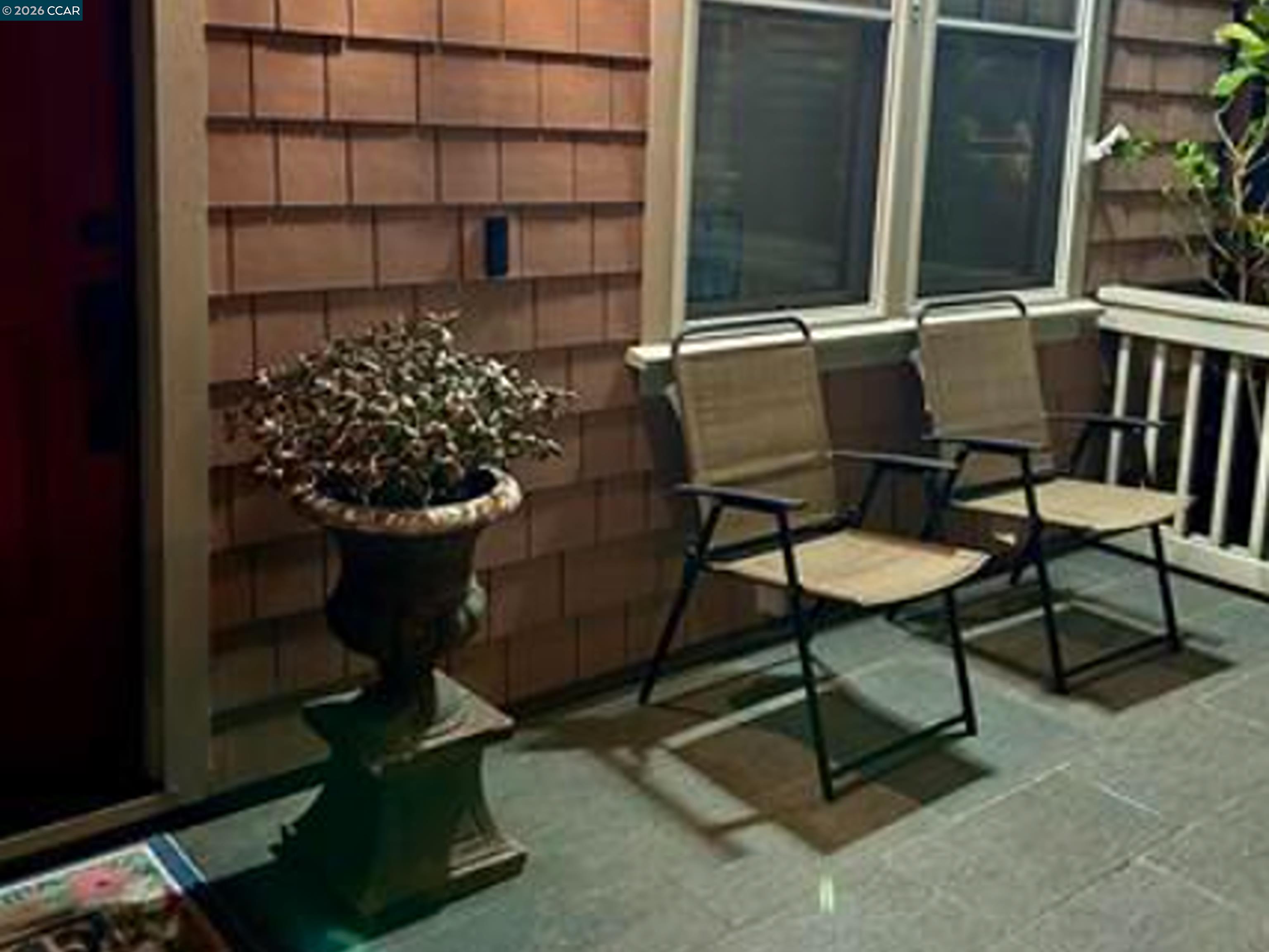 2036 Serra Lane Hercules, CA 94547 - Photo 25 of 50 a balcony with table and chairs