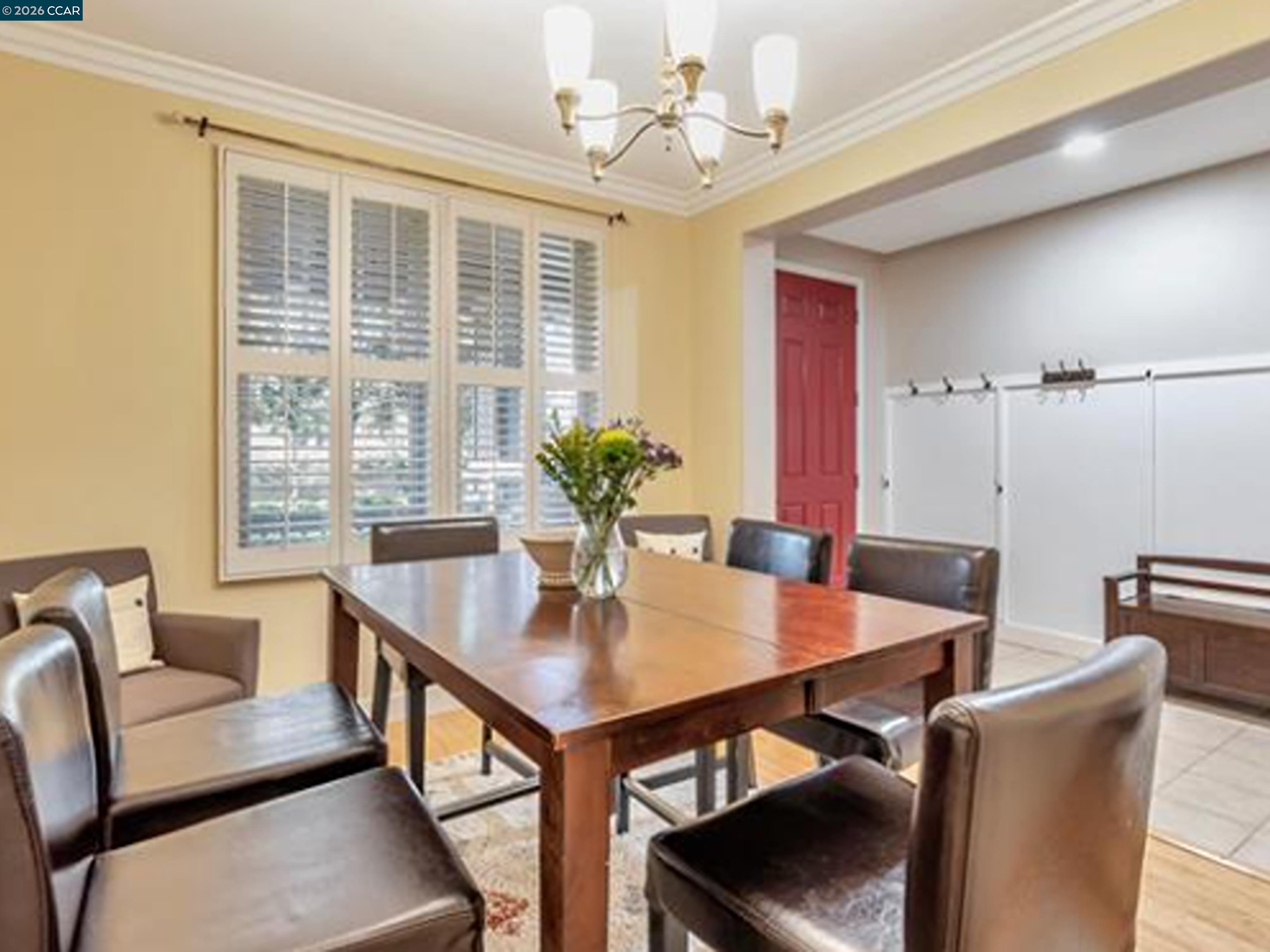 2036 Serra Lane Hercules, CA 94547 - Photo 27 of 50 a view of a dining room with furniture window and wooden floor