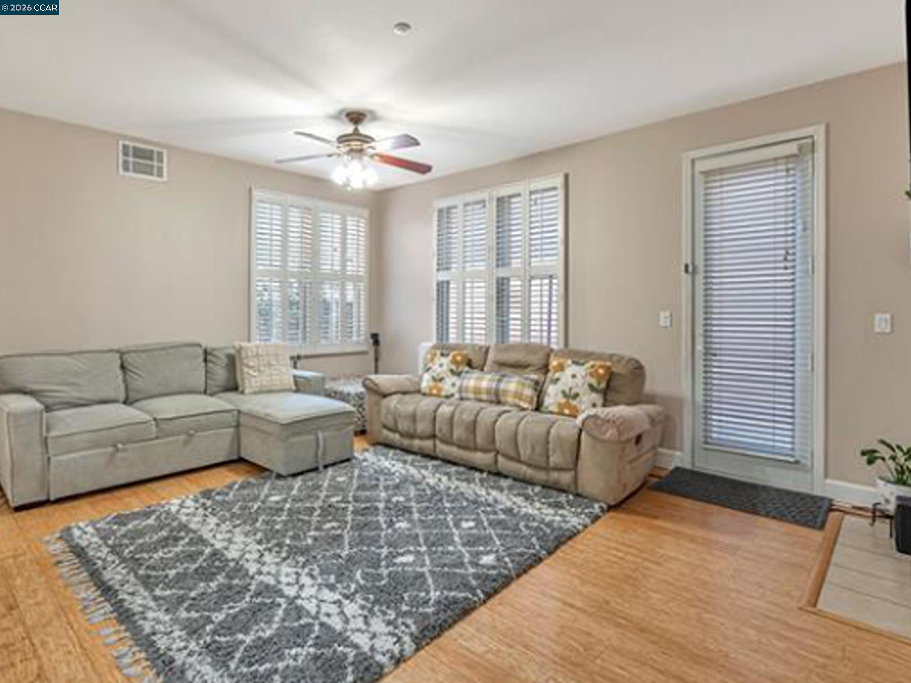 2036 Serra Lane Hercules, CA 94547 - Photo 30 of 50 a living room with furniture and a large window