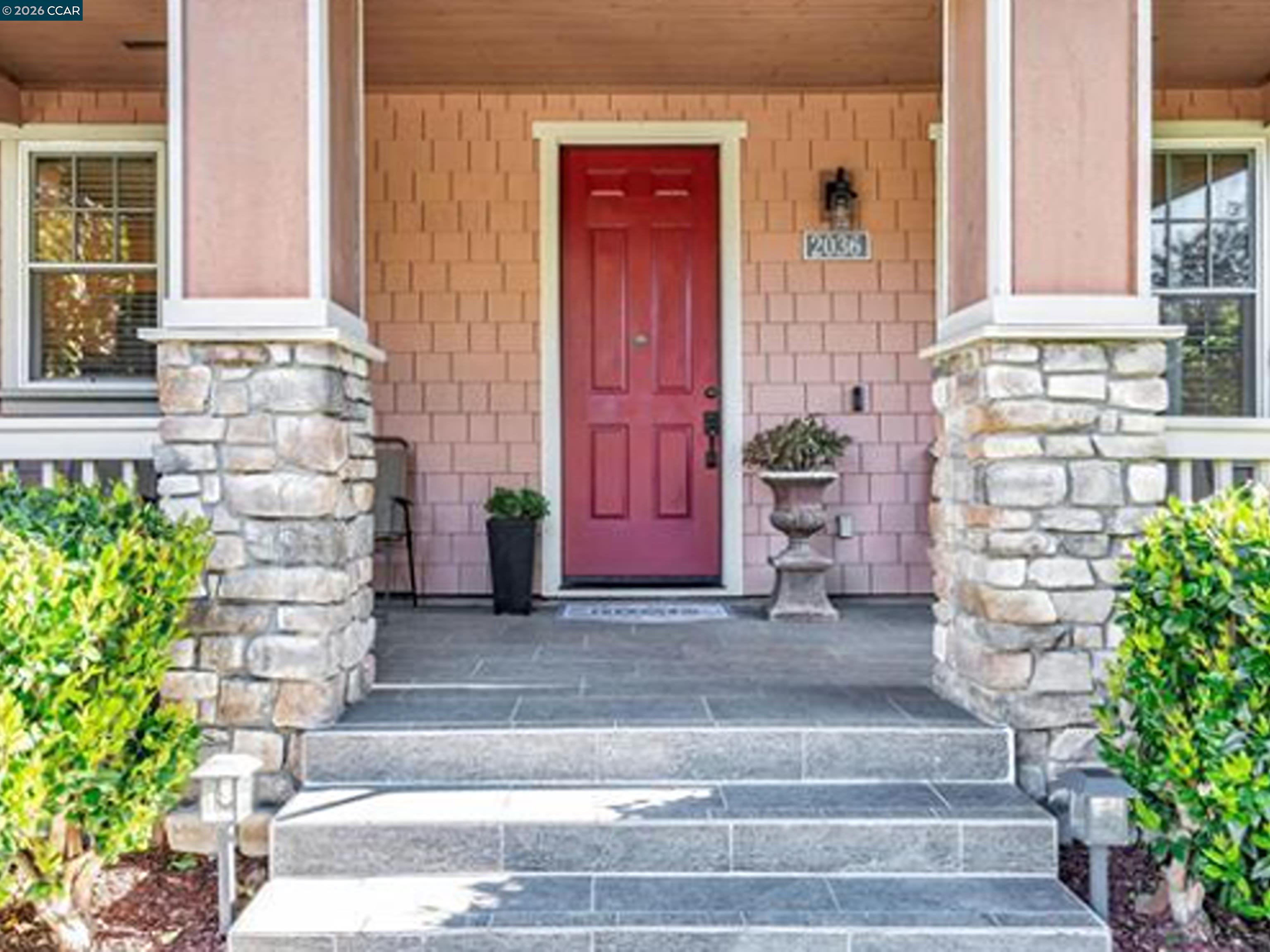 2036 Serra Lane Hercules, CA 94547 - Photo 49 of 50 a front view of a house with potted plants