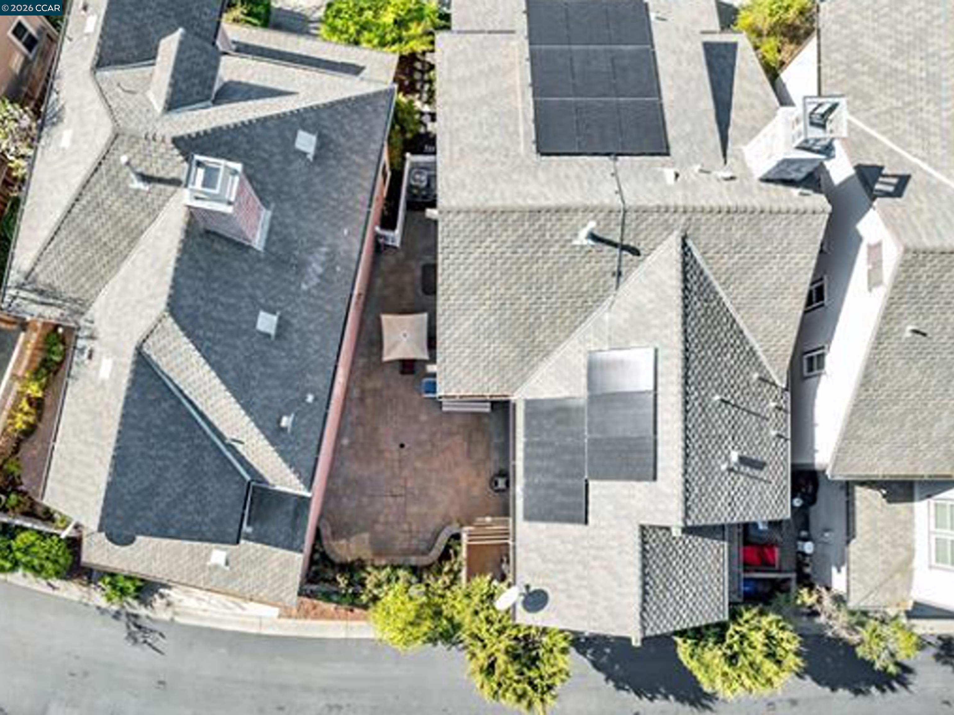 2036 Serra Lane Hercules, CA 94547 - Photo 7 of 50 an aerial view of a house with a yard and garage