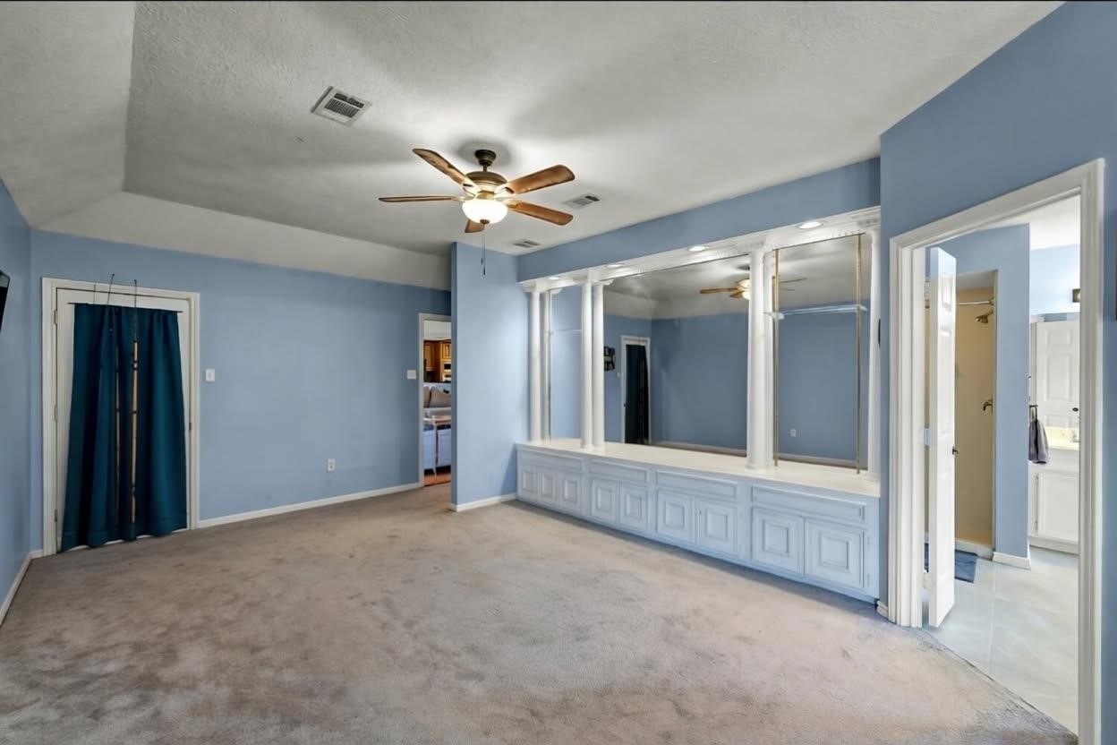 251 Petty Road Waller, TX 77484 - Photo 11 of 25 a view of an empty room with a window