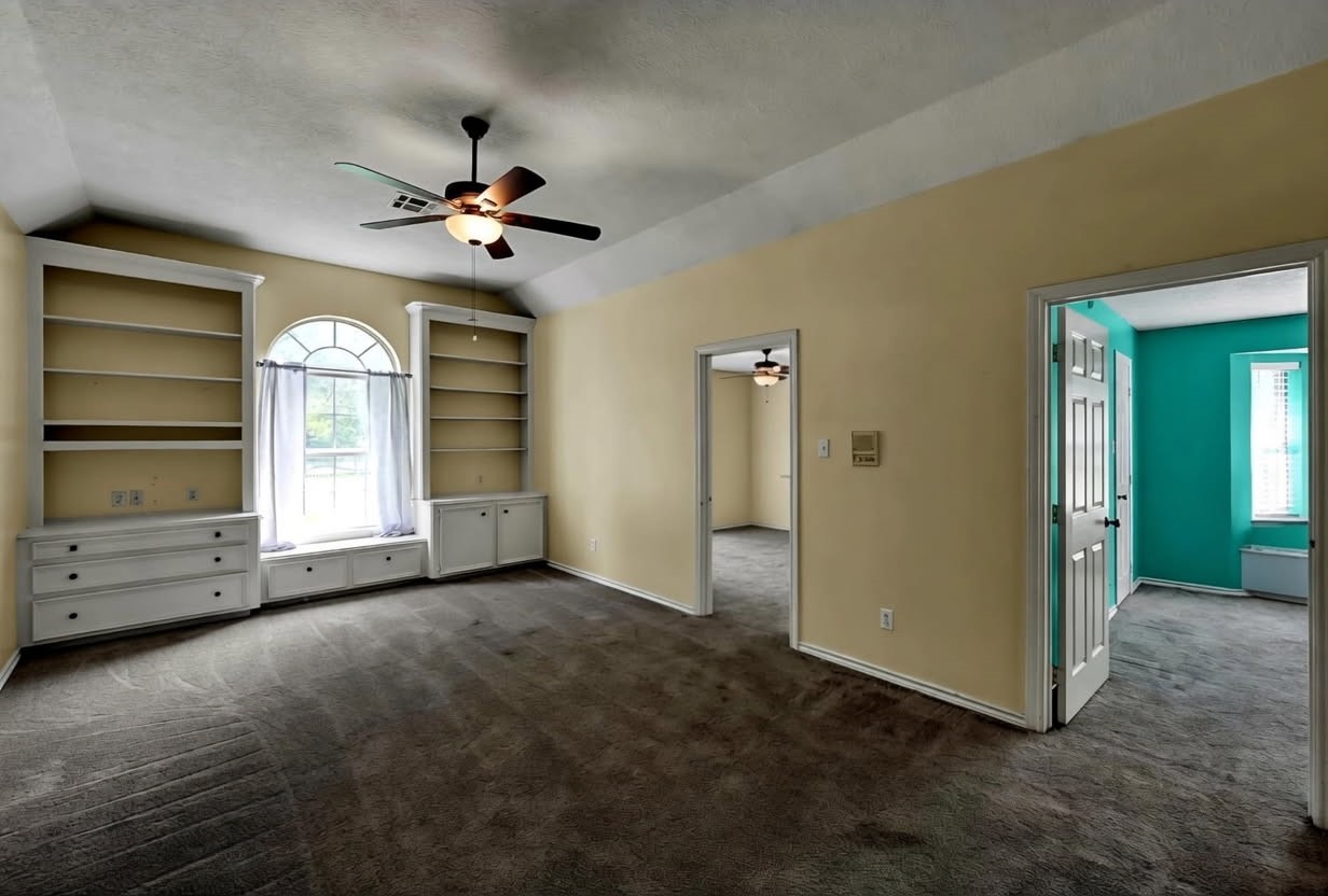 251 Petty Road Waller, TX 77484 - Photo 17 of 25 wooden floor in an empty room with a window