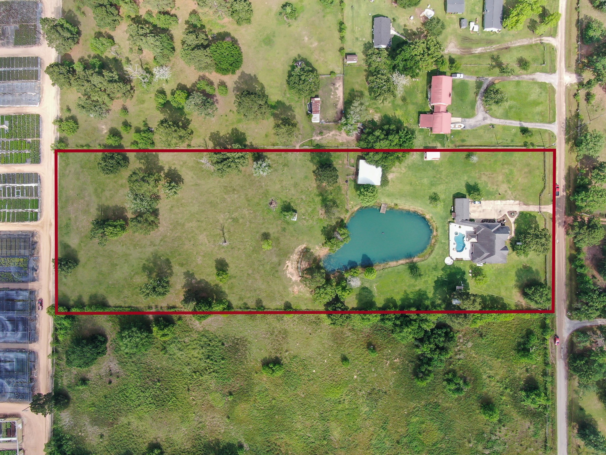 251 Petty Road Waller, TX 77484 - Photo 24 of 25 an aerial view of a residential houses with outdoor space and street view
