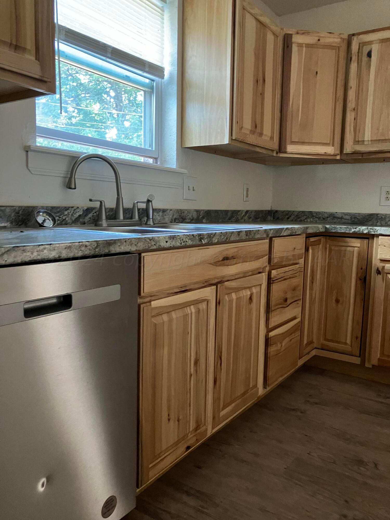 5025 South Milam Street Amarillo, TX 79110 - Photo 8 of 12 KITCHEN VIEW 1