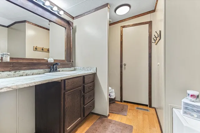 a bathroom with a tub and shower