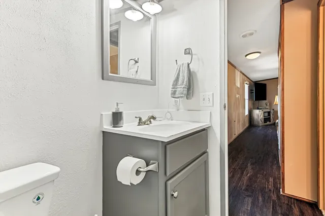 a view of a street with houses on both side