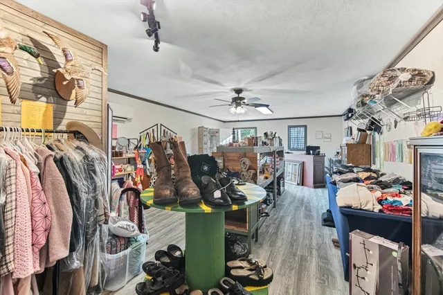 a view of outdoor space with garden and trees