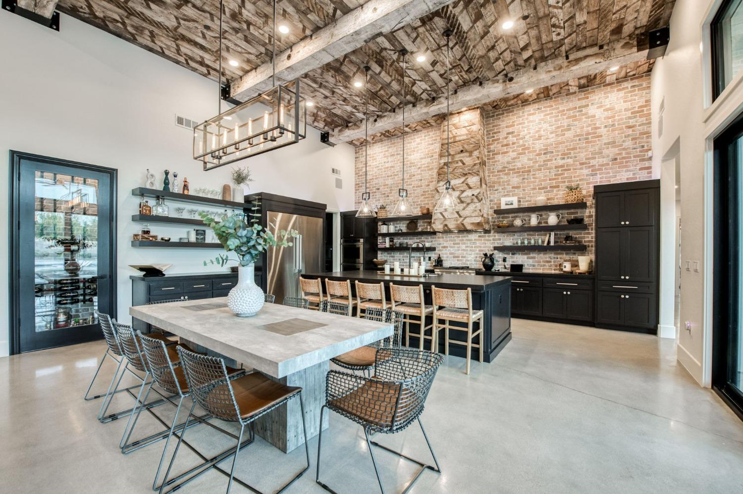3895 East Reno Avenue Clovis, CA 93619 - Photo 12 of 67 a view of a dining room with furniture