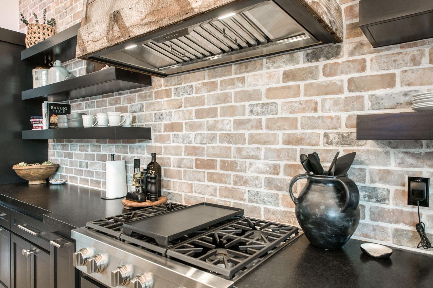 3895 East Reno Avenue Clovis, CA 93619 - Photo 14 of 67 a stove top oven sitting inside of a kitchen