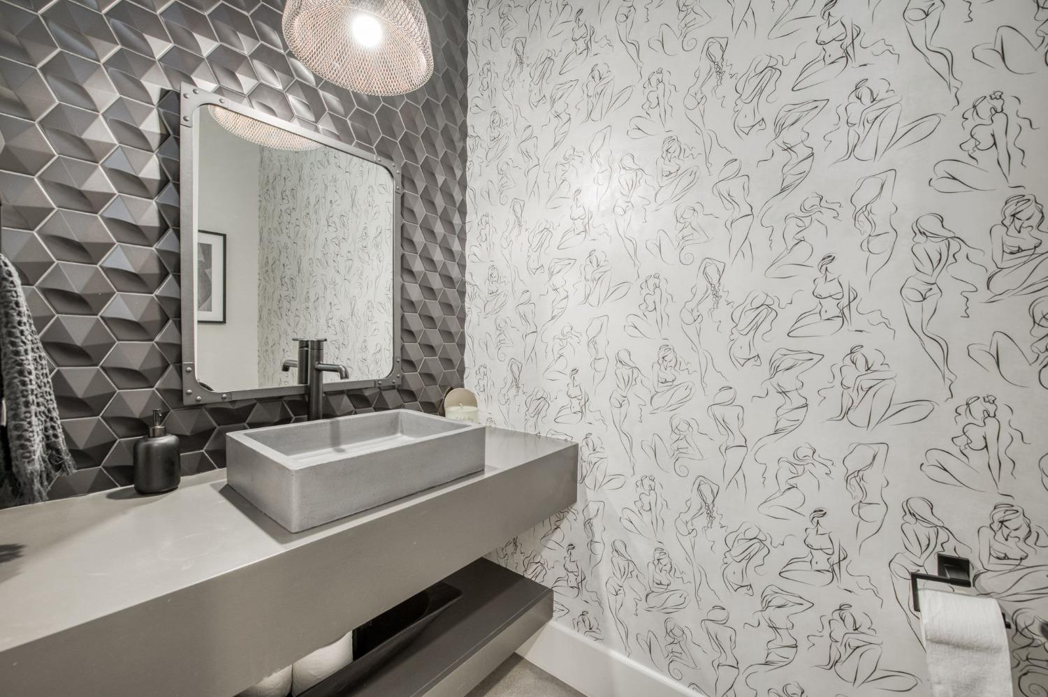 3895 East Reno Avenue Clovis, CA 93619 - Photo 20 of 67 a bathroom with a sink and a mirror