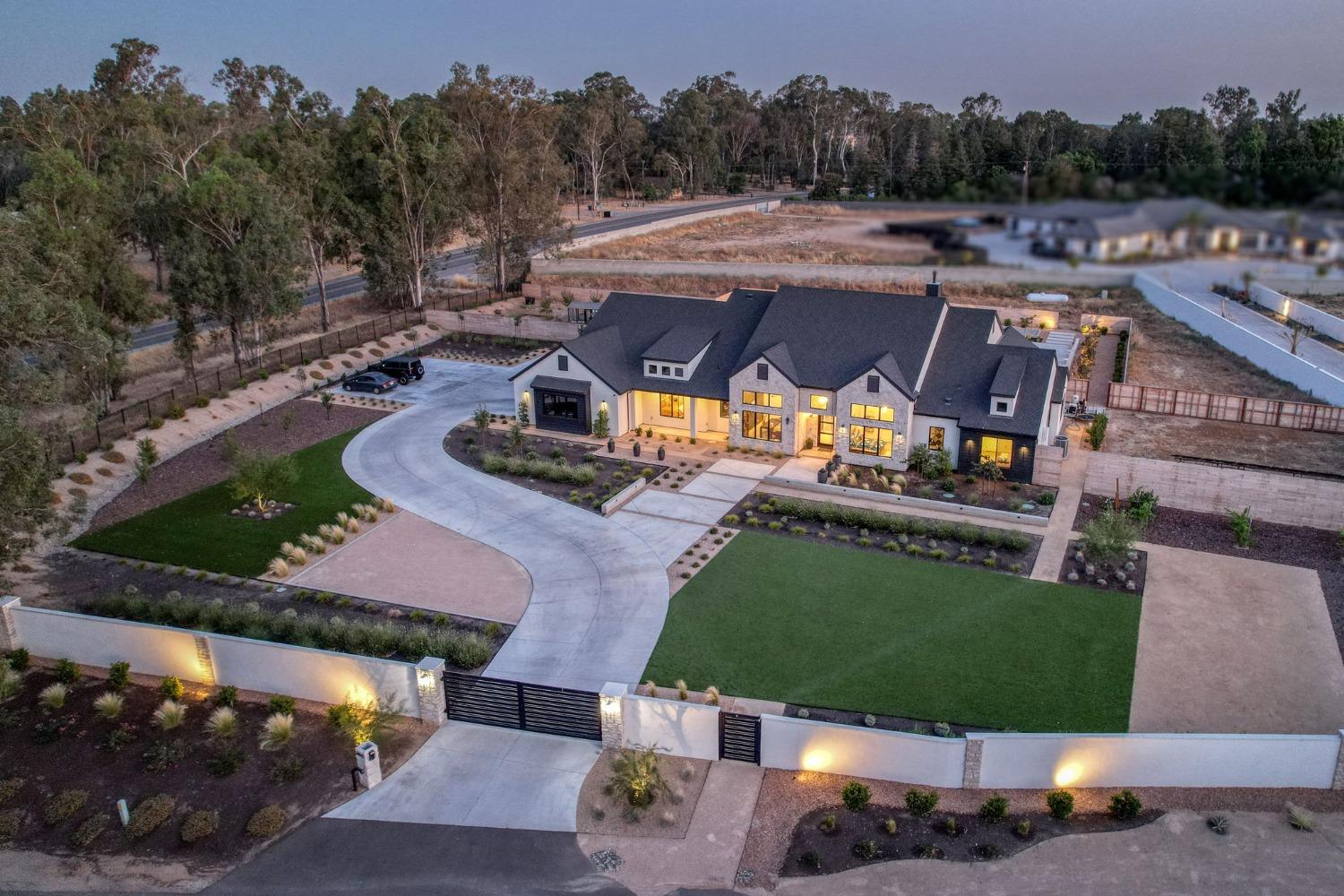 3895 East Reno Avenue Clovis, CA 93619 - Photo 2 of 67 an aerial view of a house with a yard basket ball court and outdoor seating