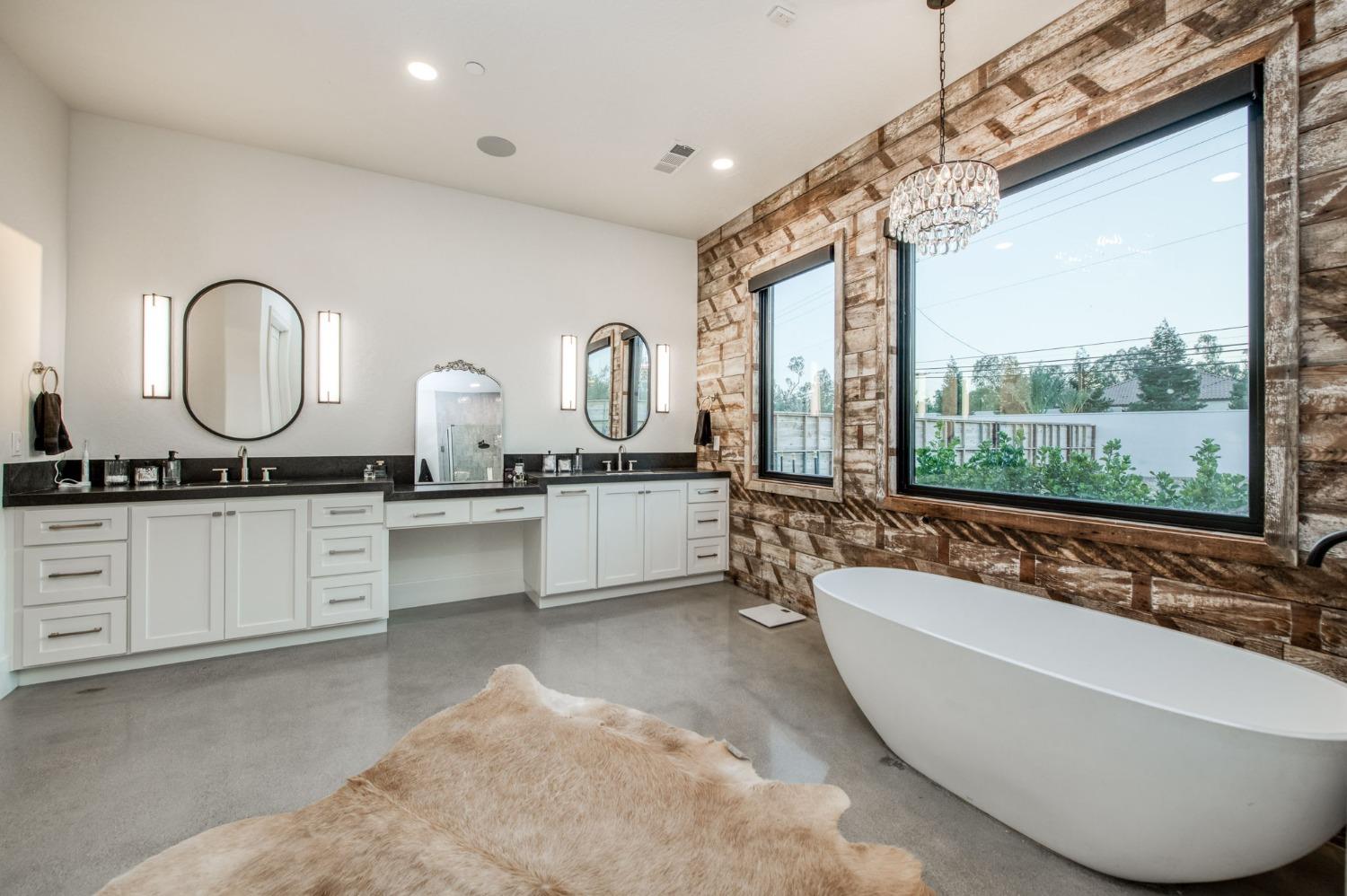 3895 East Reno Avenue Clovis, CA 93619 - Photo 39 of 67 a large white kitchen with a large window