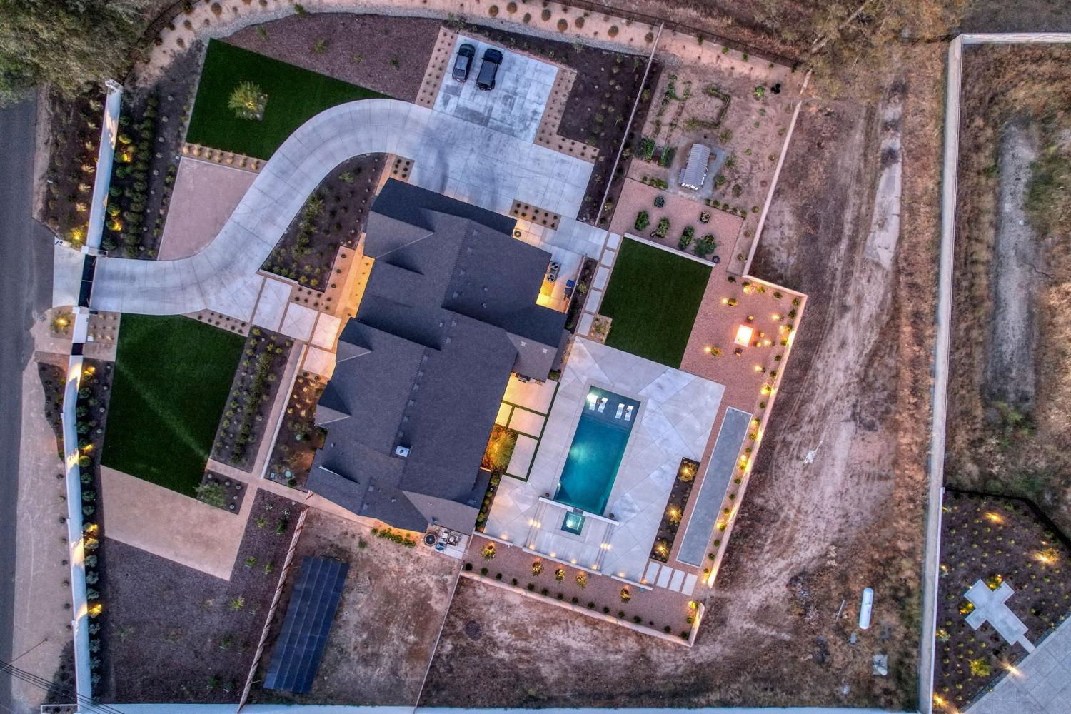 3895 East Reno Avenue Clovis, CA 93619 - Photo 57 of 67 front view of a house with a yard