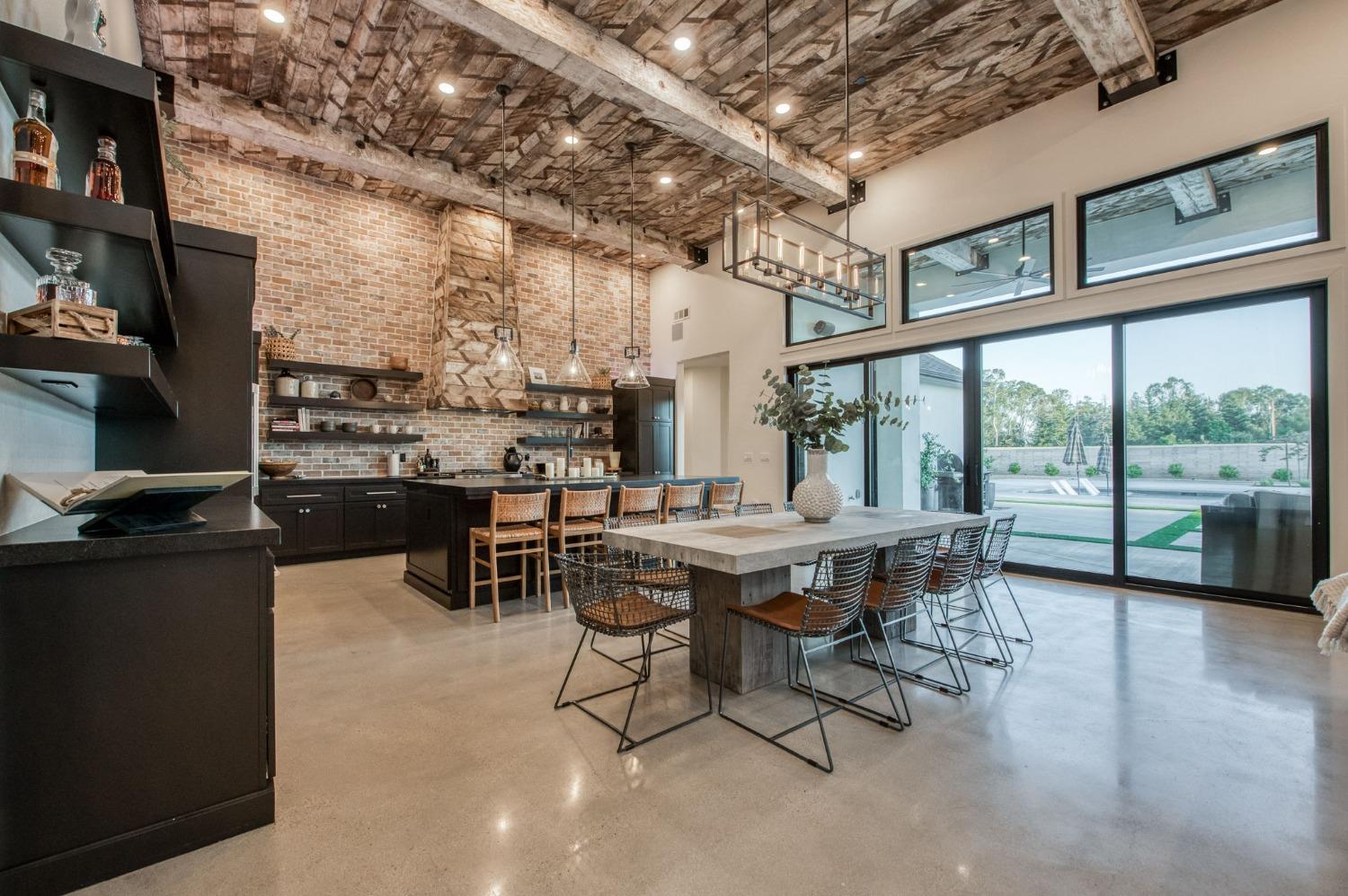 3895 East Reno Avenue Clovis, CA 93619 - Photo 8 of 67 a view of a dining room with furniture window and outside view