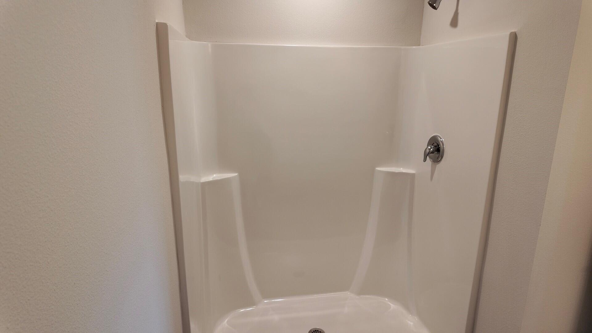 6356 Firefly Drive Milton, FL 32583 - Photo 18 of 44 a bathroom with a shower