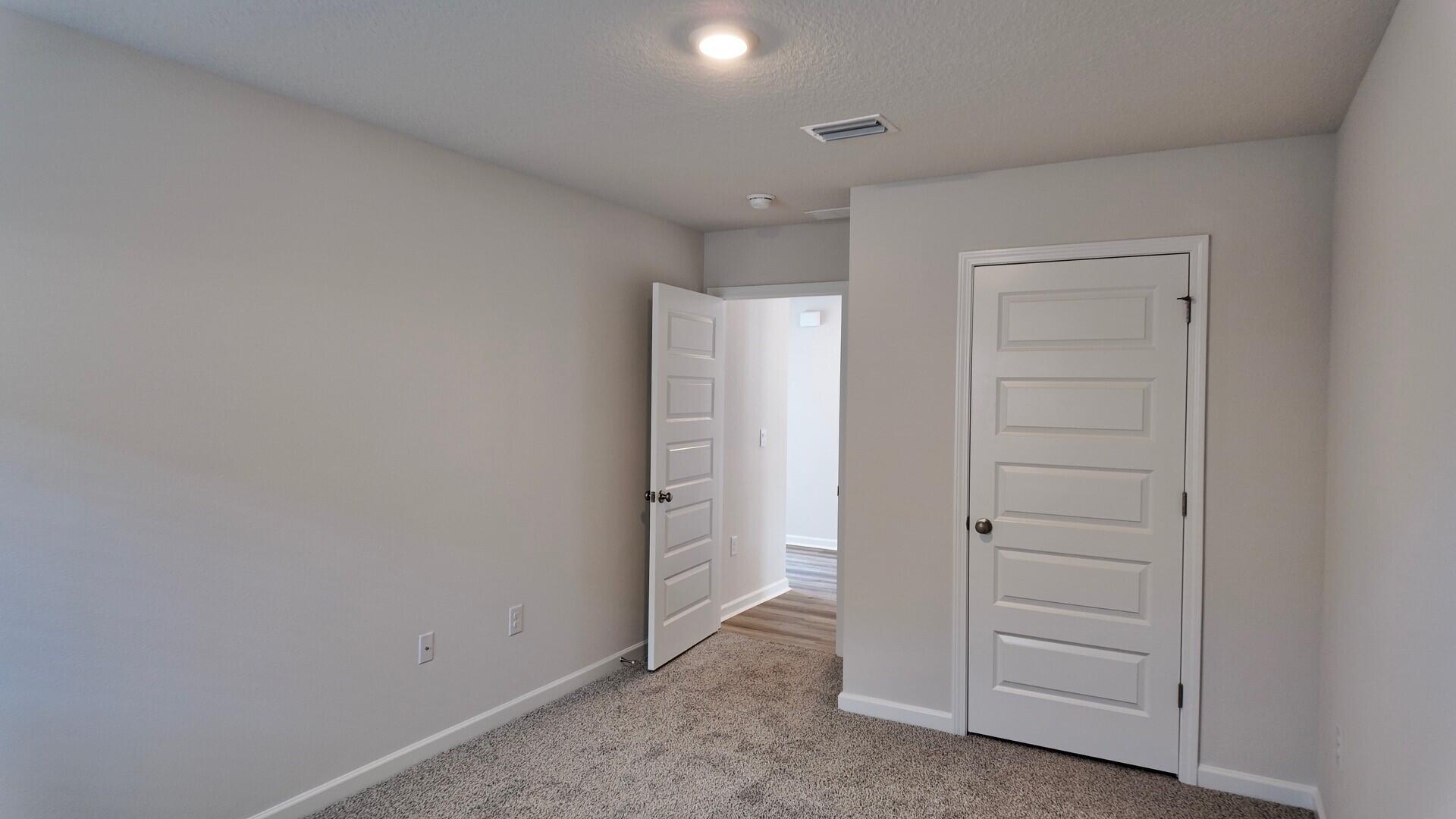 6356 Firefly Drive Milton, FL 32583 - Photo 30 of 44 an empty room with closet area