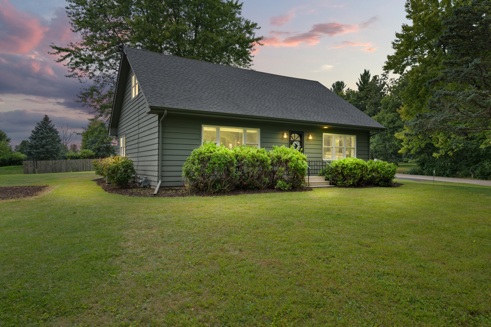 40w897 Brown Road St. Charles, IL 60175 - Photo 1 of 35 a front view of a house with garden