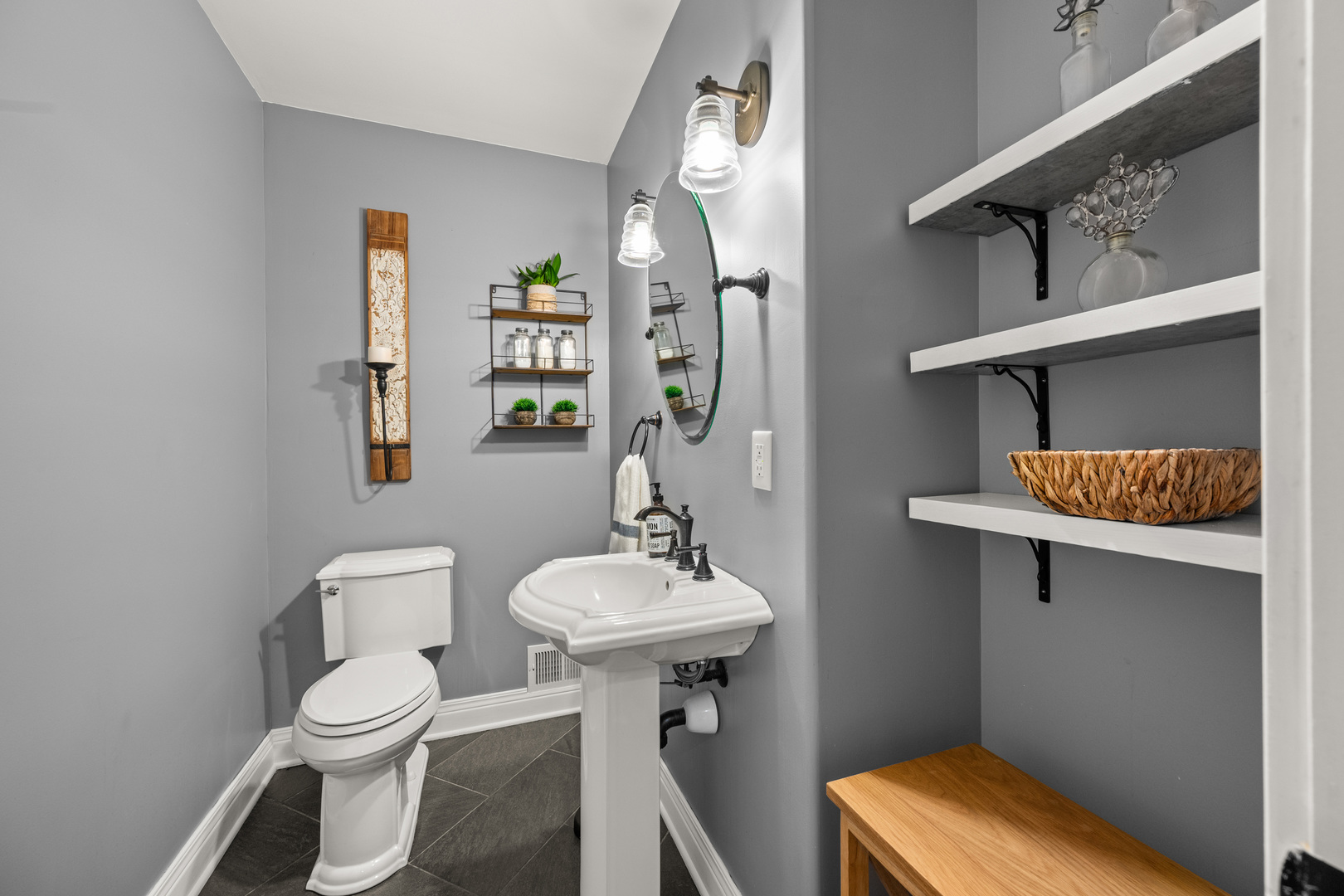 40w897 Brown Road St. Charles, IL 60175 - Photo 13 of 35 a bathroom with a toilet a sink and mirror