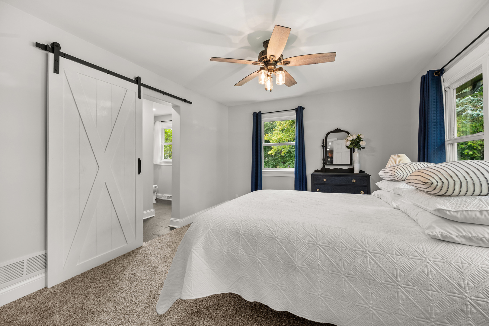 40w897 Brown Road St. Charles, IL 60175 - Photo 19 of 35 a bedroom with a bed and a chandelier