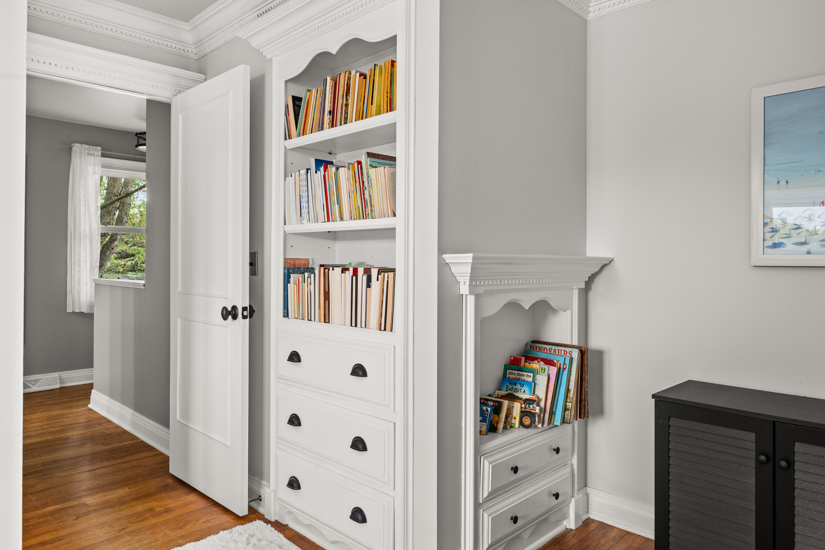 40w897 Brown Road St. Charles, IL 60175 - Photo 25 of 35 a room with a book shelf and a window